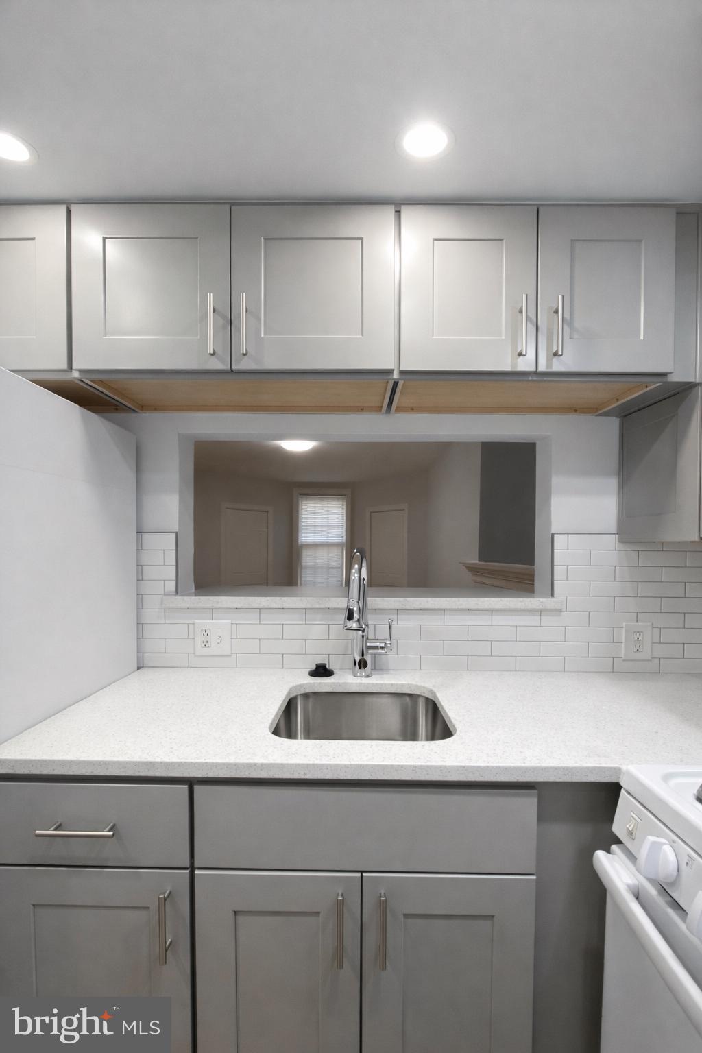 1701-03 Spruce Street, Unit 3R Philadelphia, PA 19103 - Photo 5 of 6 a kitchen with a sink and cabinets