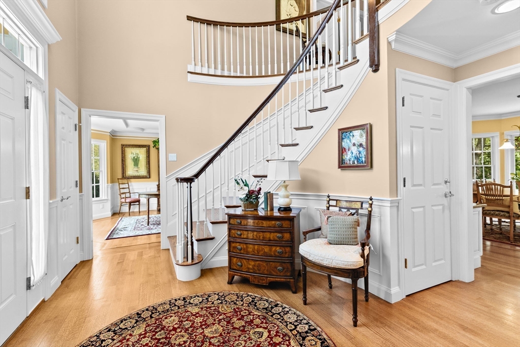 75 Thistle Road North Andover, MA 01845 - Photo 21 of 42 a view of entryway livingroom and hall with wooden floor
