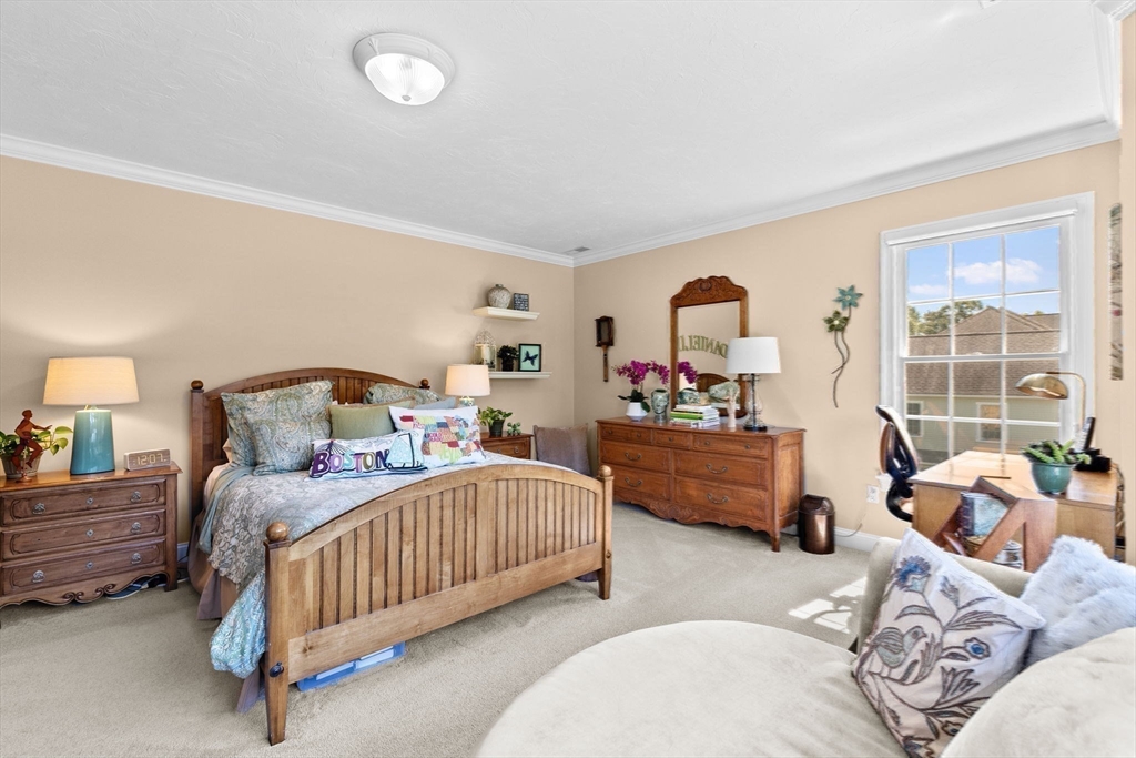 75 Thistle Road North Andover, MA 01845 - Photo 29 of 42 a bedroom with a bed and a large window