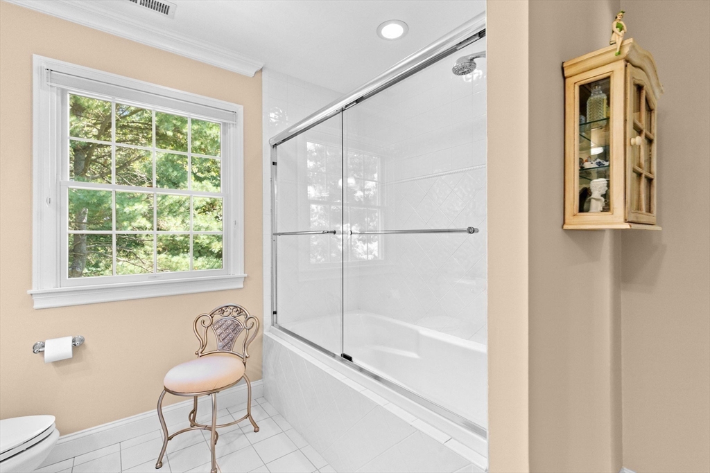 75 Thistle Road North Andover, MA 01845 - Photo 32 of 42 a bathroom with a granite countertop sink a toilet and shower