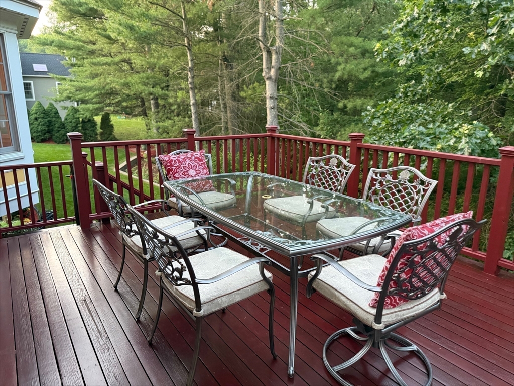 75 Thistle Road North Andover, MA 01845 - Photo 39 of 42 a roof deck with chairs and wooden floor