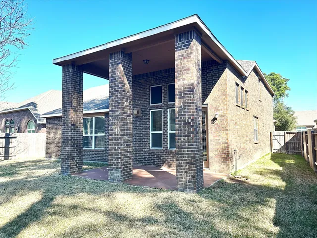 a view of backyard of house