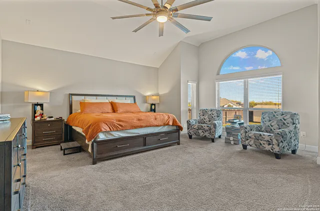 a bedroom with bed and window