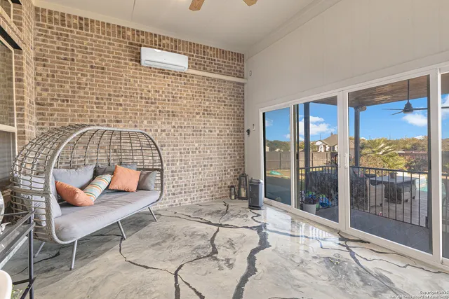 a workspace with furniture and a window