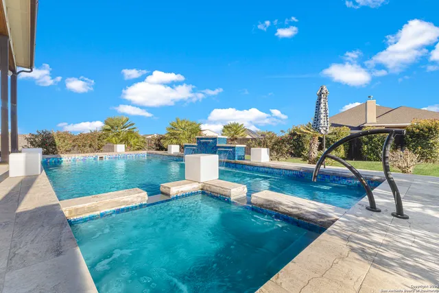 a view of a lake with a garden