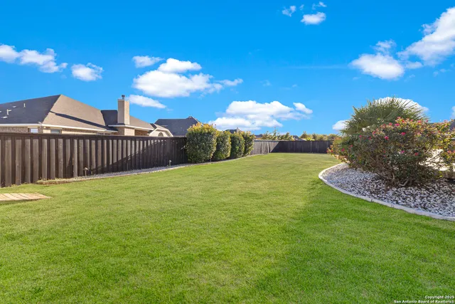 a view of a garden with a slide