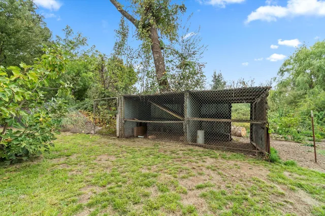 a view of a wooden floor and a yard