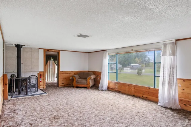 a living room with furniture and a gate