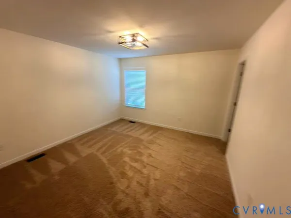 a view of empty room with window