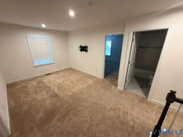 a bathroom with a double vanity sink a and mirror
