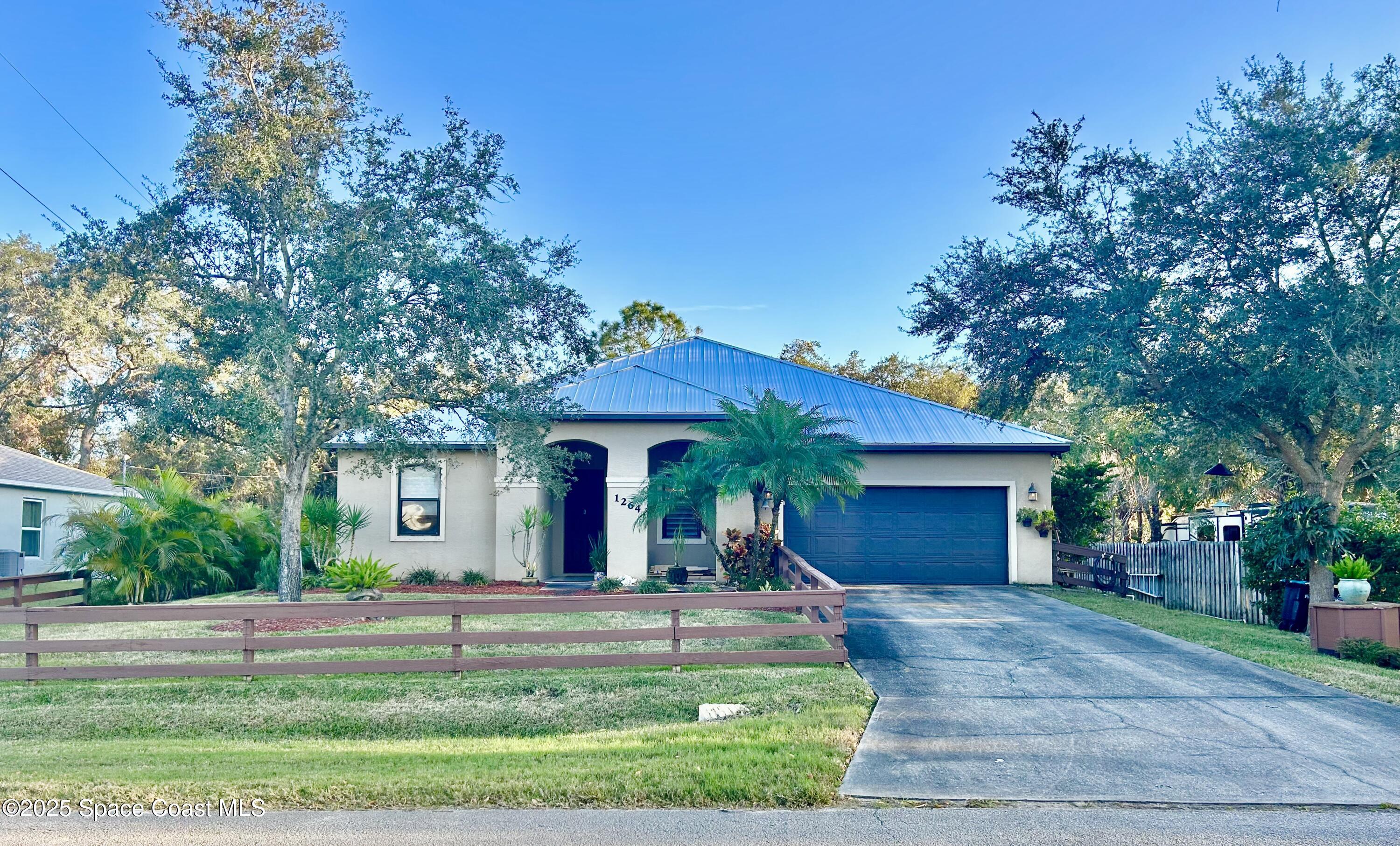 1264 Valleybrook Road Southeast Palm Bay, FL 32909 - Photo 1 of 37 IMG_1304