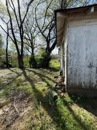 a view of backyard with green space
