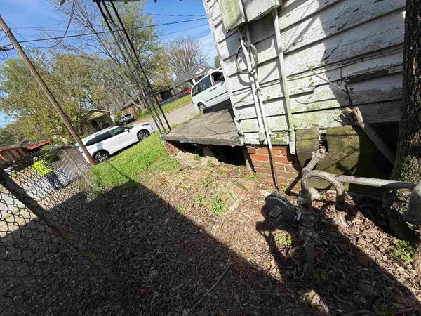 a view of yard with patio