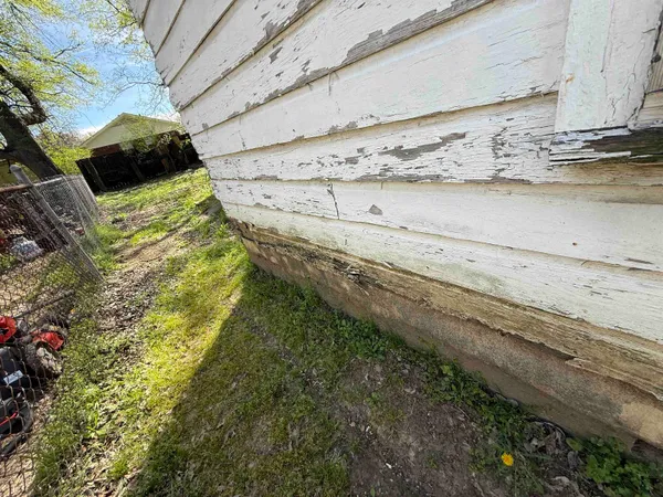 a view of a wooden floor in a backyard
