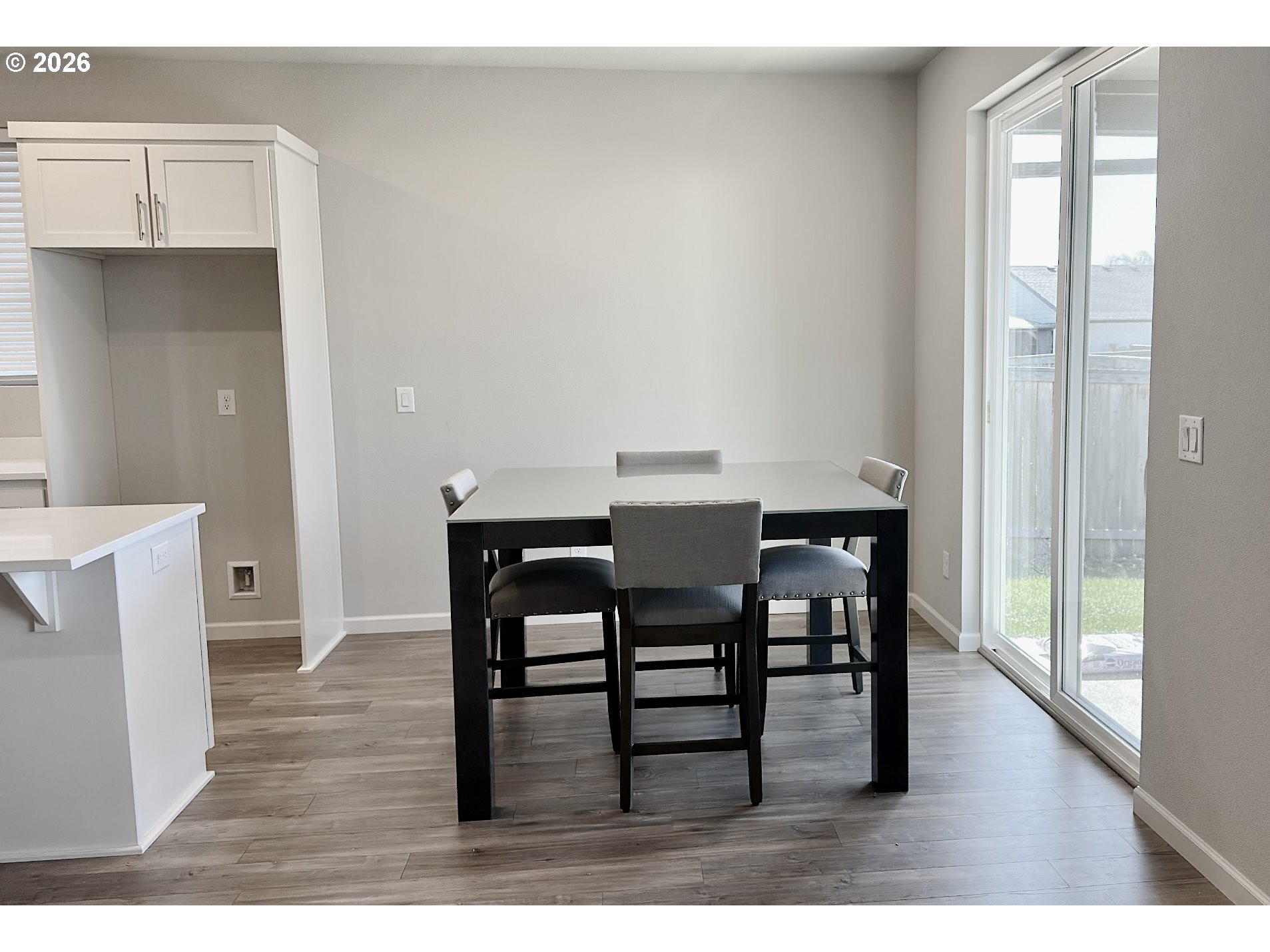 2011 Bethany Street Longview, WA 98632 - Photo 12 of 24 a view of a dining room with furniture and wooden floor