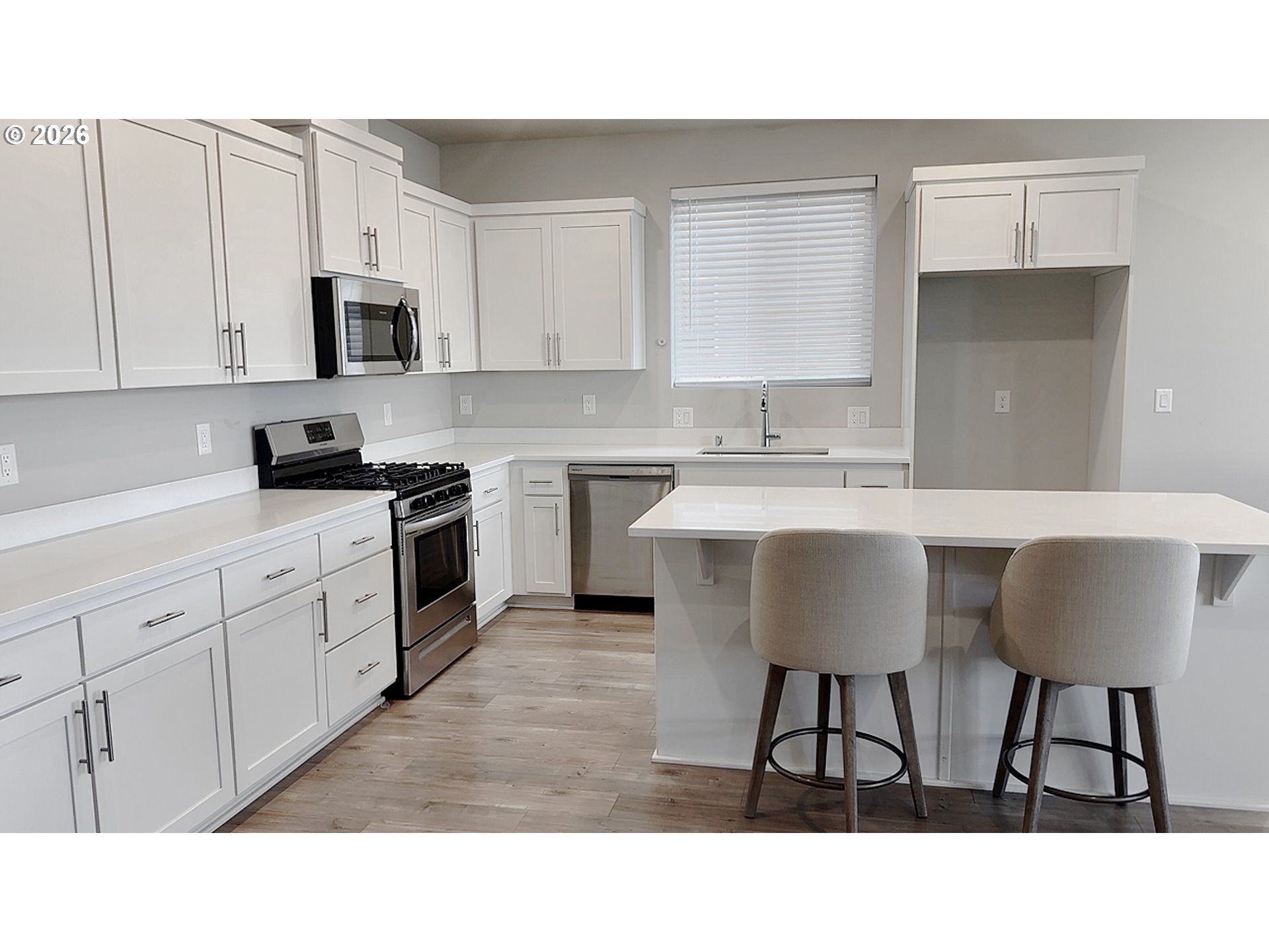 2011 Bethany Street Longview, WA 98632 - Photo 14 of 24 a kitchen with a sink cabinets and window