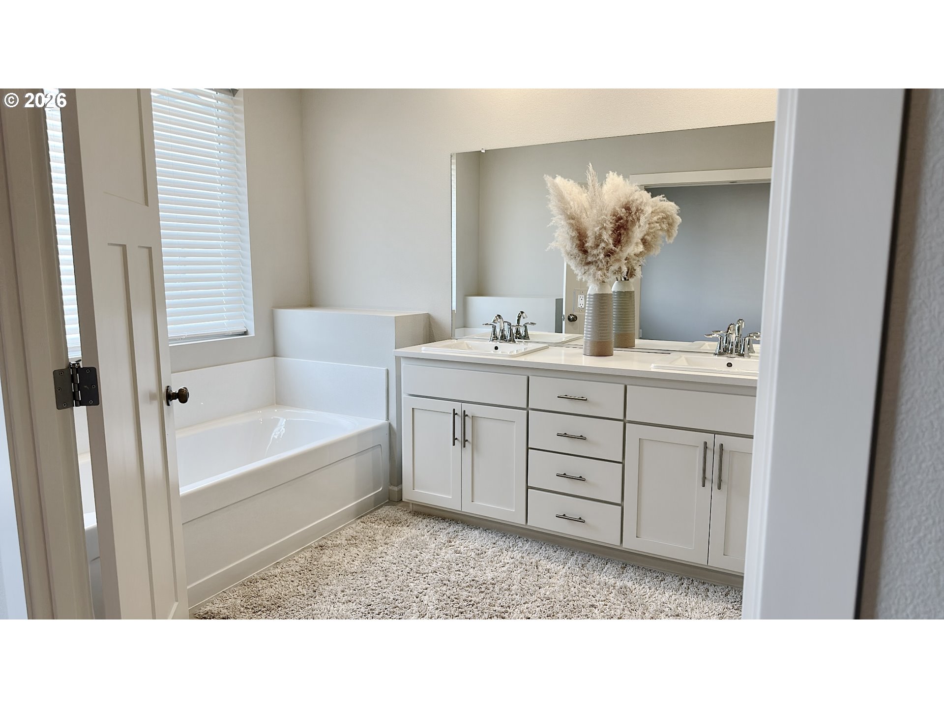 2011 Bethany Street Longview, WA 98632 - Photo 18 of 24 a bathroom with a sink tub shower and a mirror