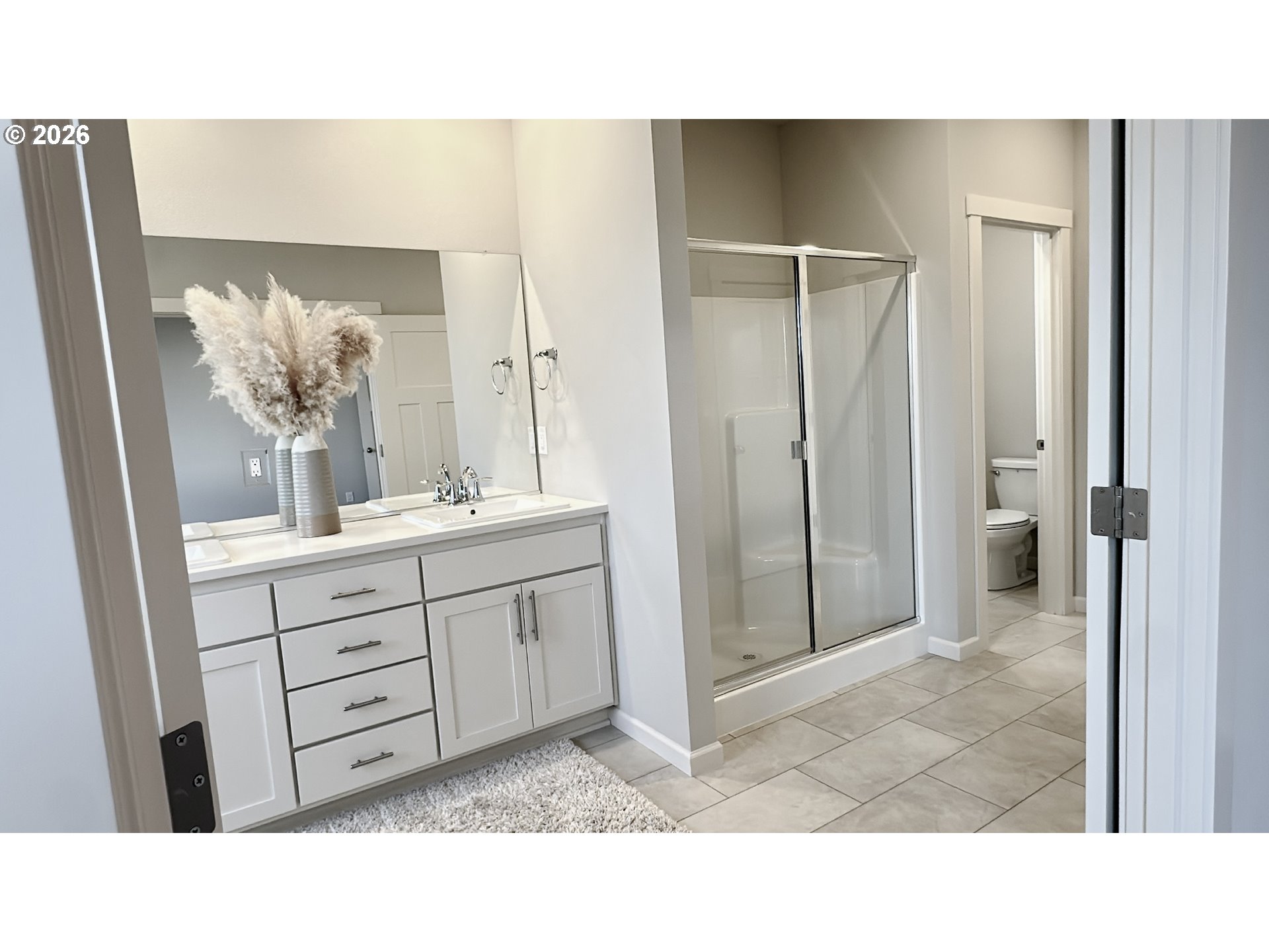 2011 Bethany Street Longview, WA 98632 - Photo 19 of 24 a bathroom with a sink double vanity and a mirror