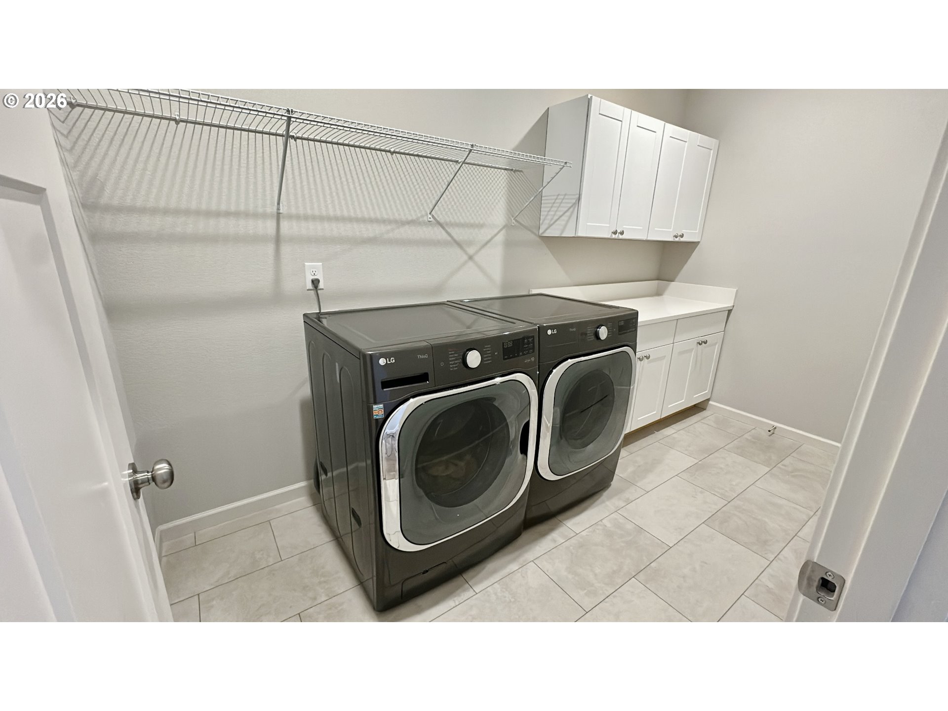 2011 Bethany Street Longview, WA 98632 - Photo 22 of 24 a utility room with dryer and washer