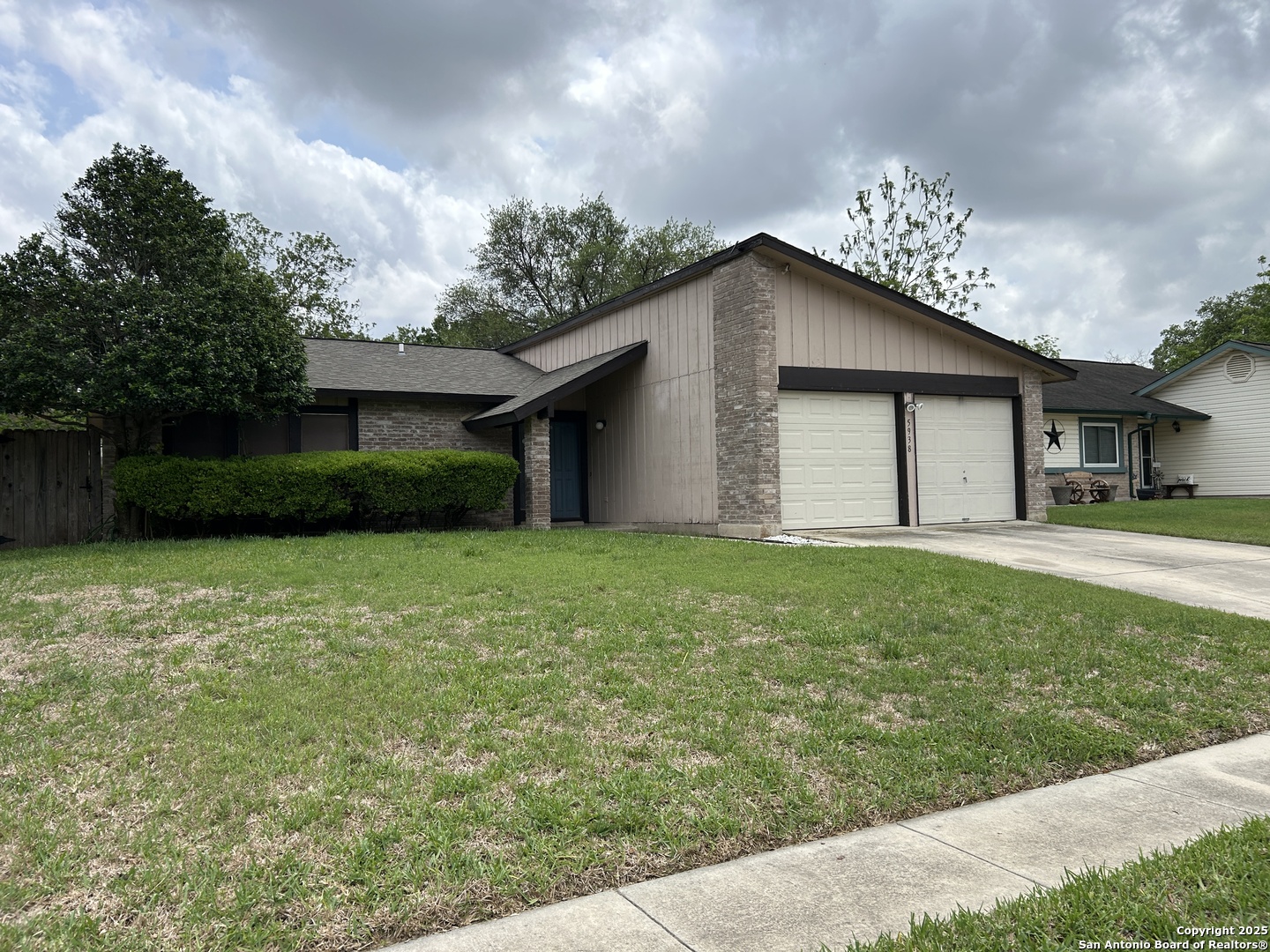 5938 Kissing Oak Street San Antonio, TX 78247 - Photo 1 of 11 a view of a house with a yard and potted plants