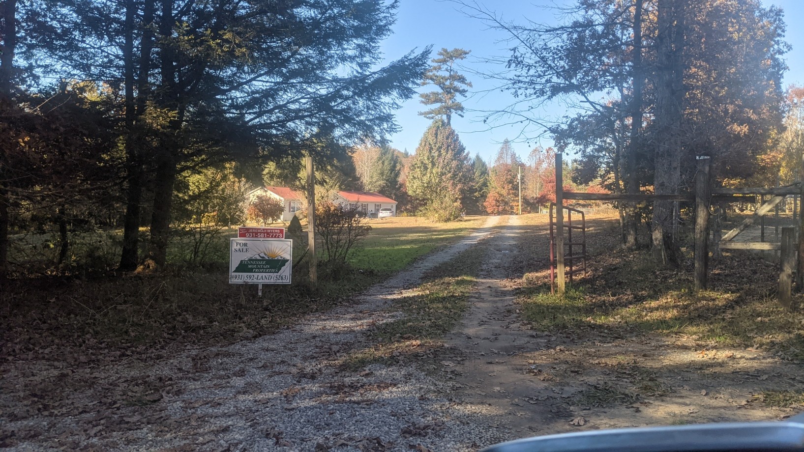 599 Little Fiery Road Sequatchie, TN 37374 - Photo 2 of 34 a backyard of a house with table and chairs