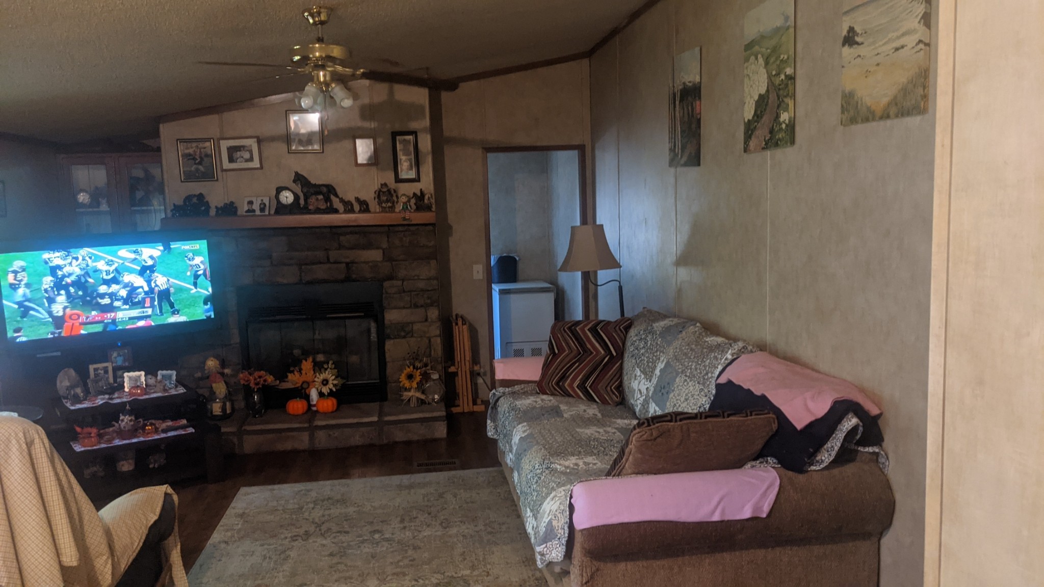 599 Little Fiery Road Sequatchie, TN 37374 - Photo 14 of 34 a living room with furniture and a fireplace
