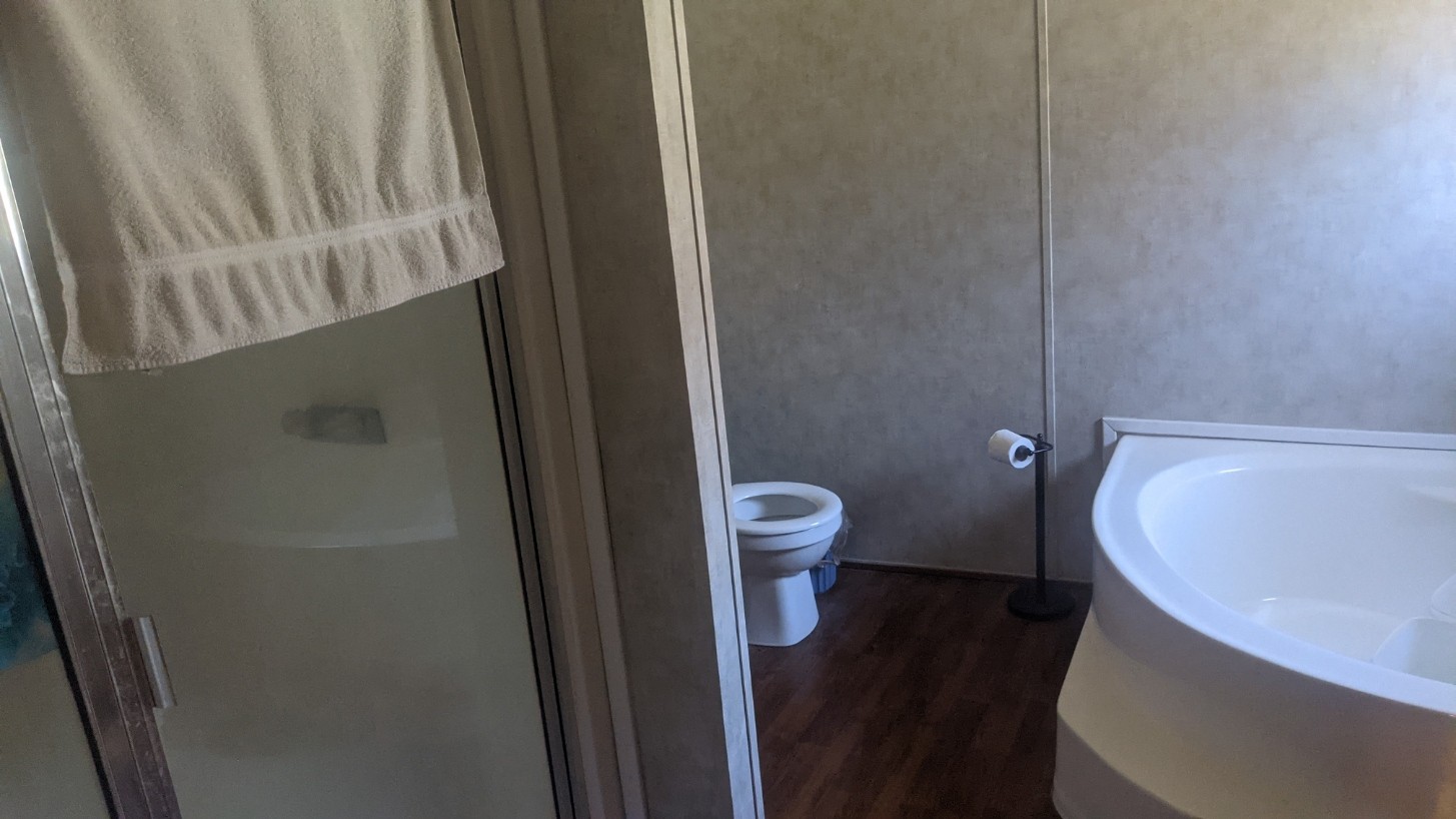 599 Little Fiery Road Sequatchie, TN 37374 - Photo 18 of 34 a bathroom with a sink and toilet