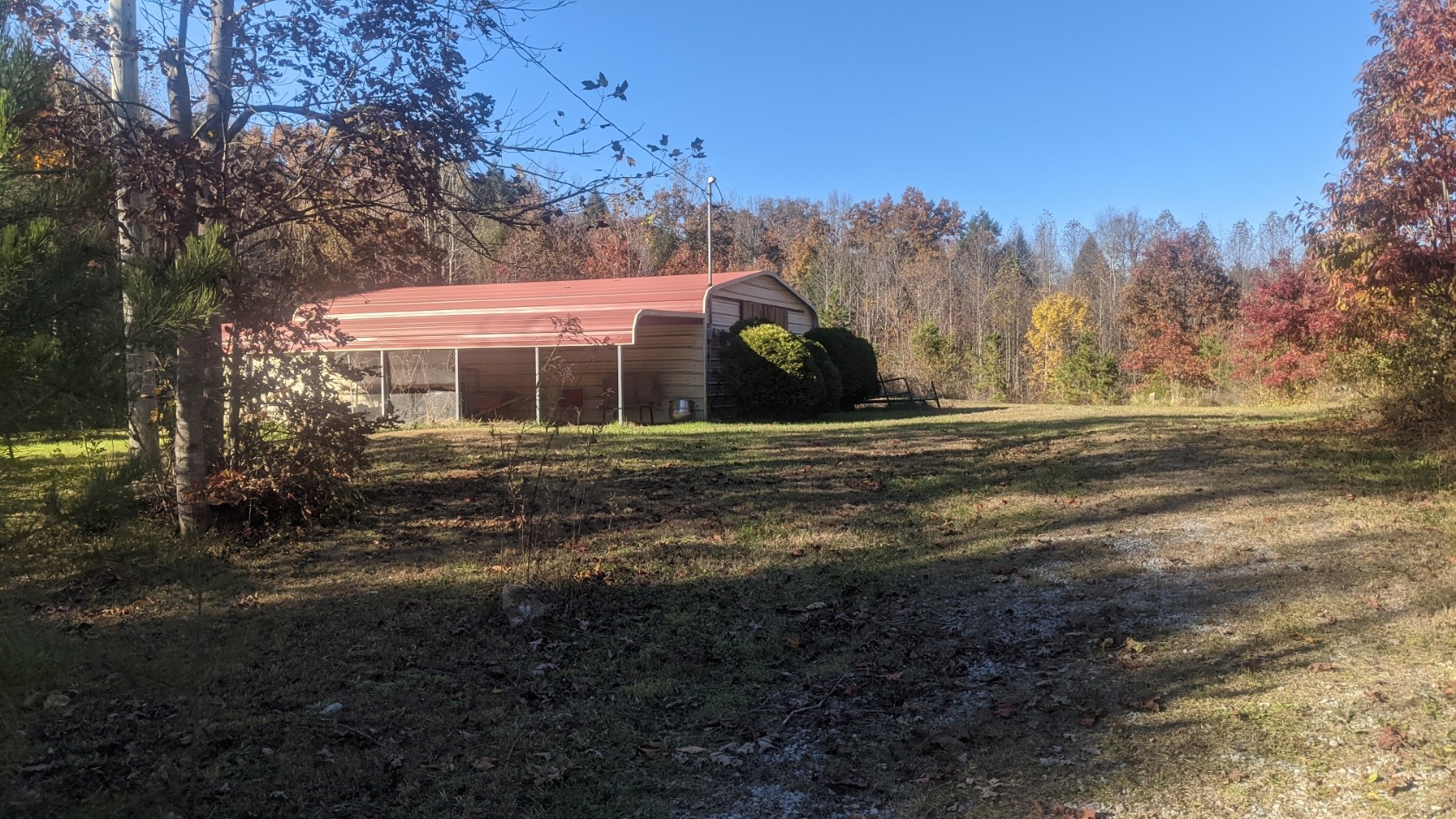 599 Little Fiery Road Sequatchie, TN 37374 - Photo 29 of 34 a view of a house with a yard