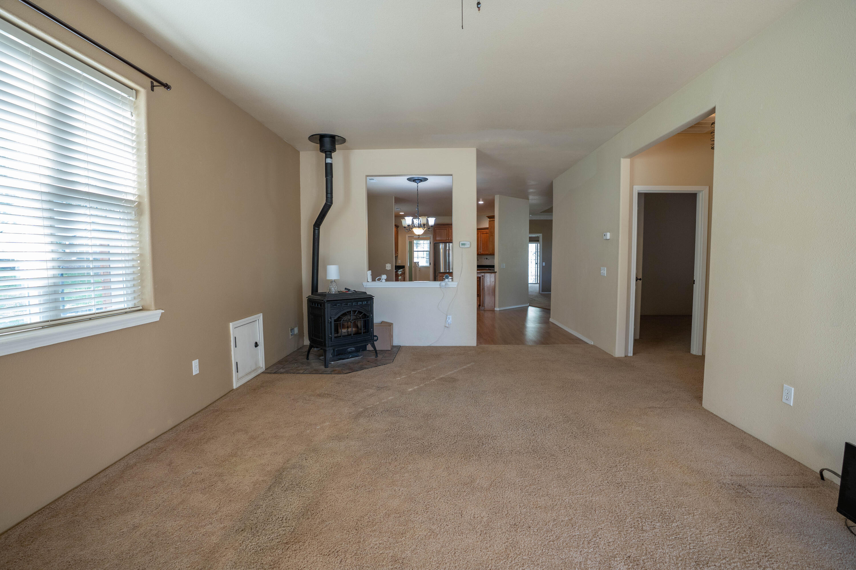 2080 Swingle Road Trail, OR 97541 - Photo 29 of 52 Secondary family room view to dining with stove.
