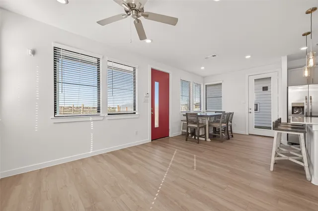 a view of a livingroom with furniture and window