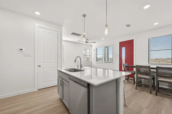 a very nice looking dining room with a table and chairs