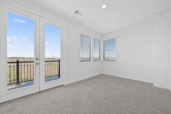 an empty room with windows