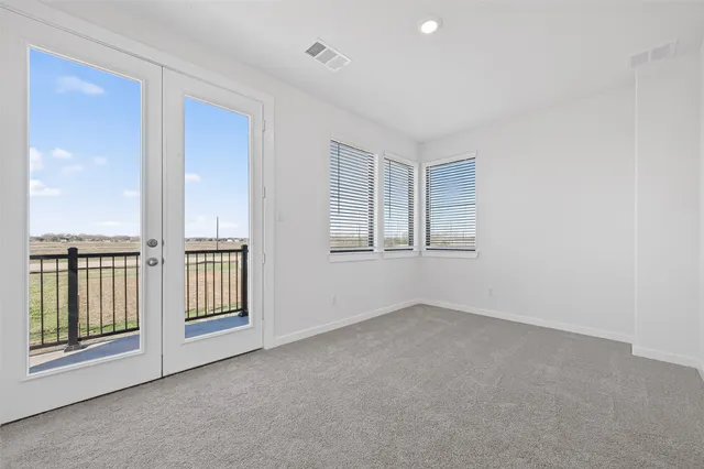 an empty room with windows