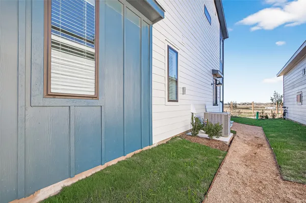 a view of a backyard with a garden