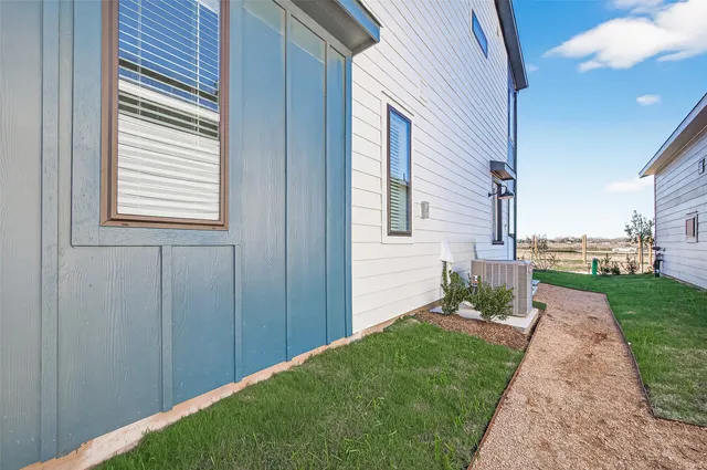 a view of a backyard with a garden