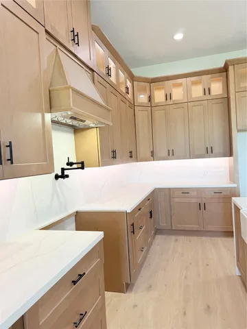 a bathroom with a sink double vanity and a mirror