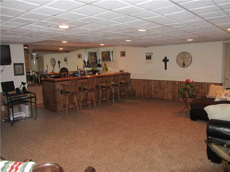 501 Shenango Road Beaver Falls, PA 15010 - Photo 19 of 25 Family Room. What a great entertainment center Large wet bar space space space This area has been completely redone