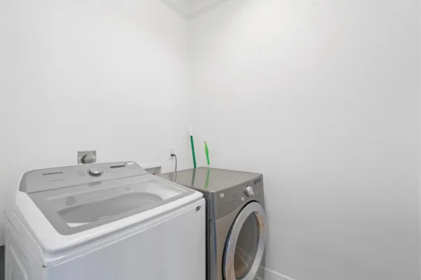 a bathroom with a granite countertop toilet a sink and a shower