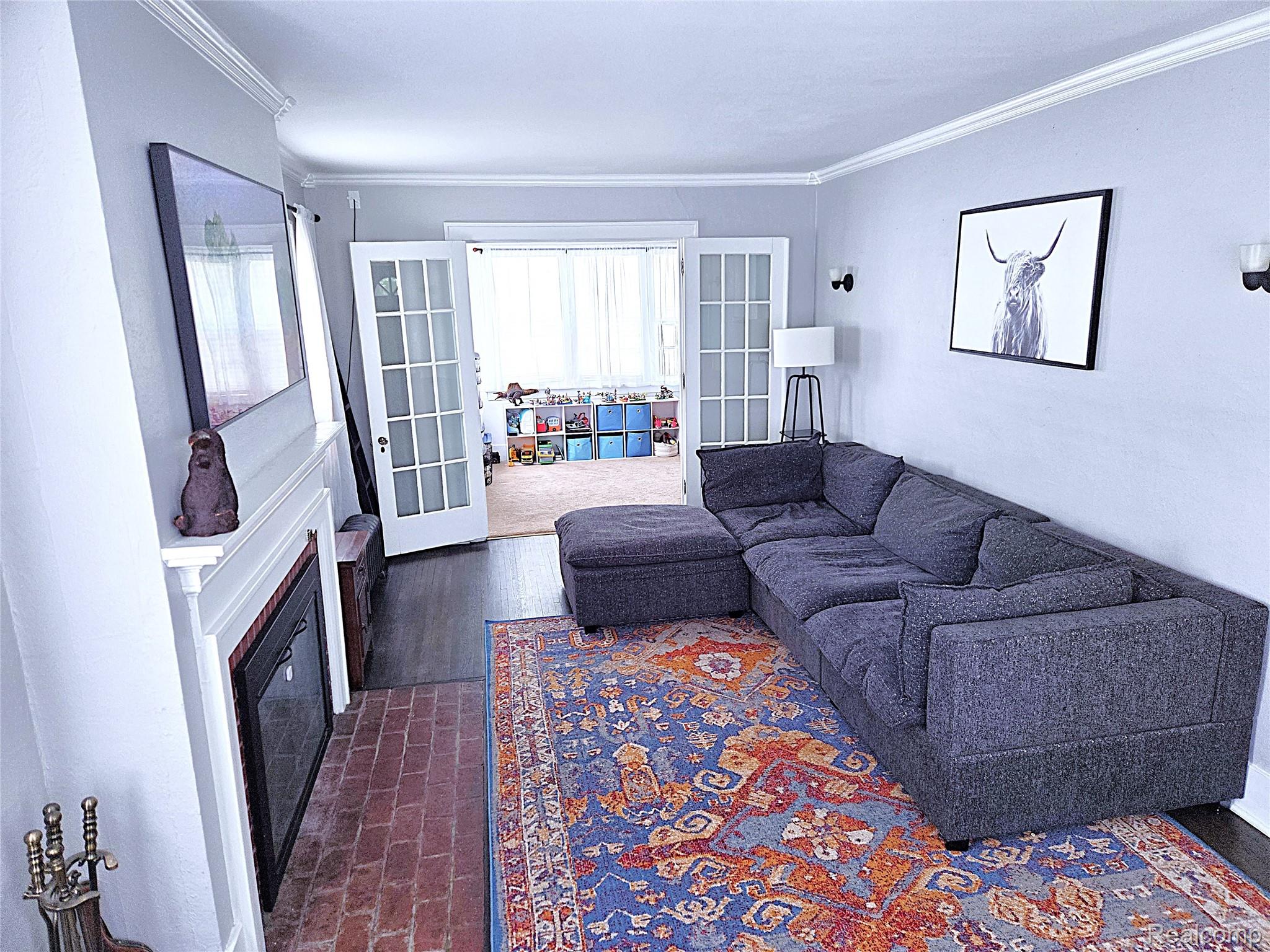205 East Iroquois Road Pontiac, MI 48341 - Photo 4 of 25 Living Room 1.jpg