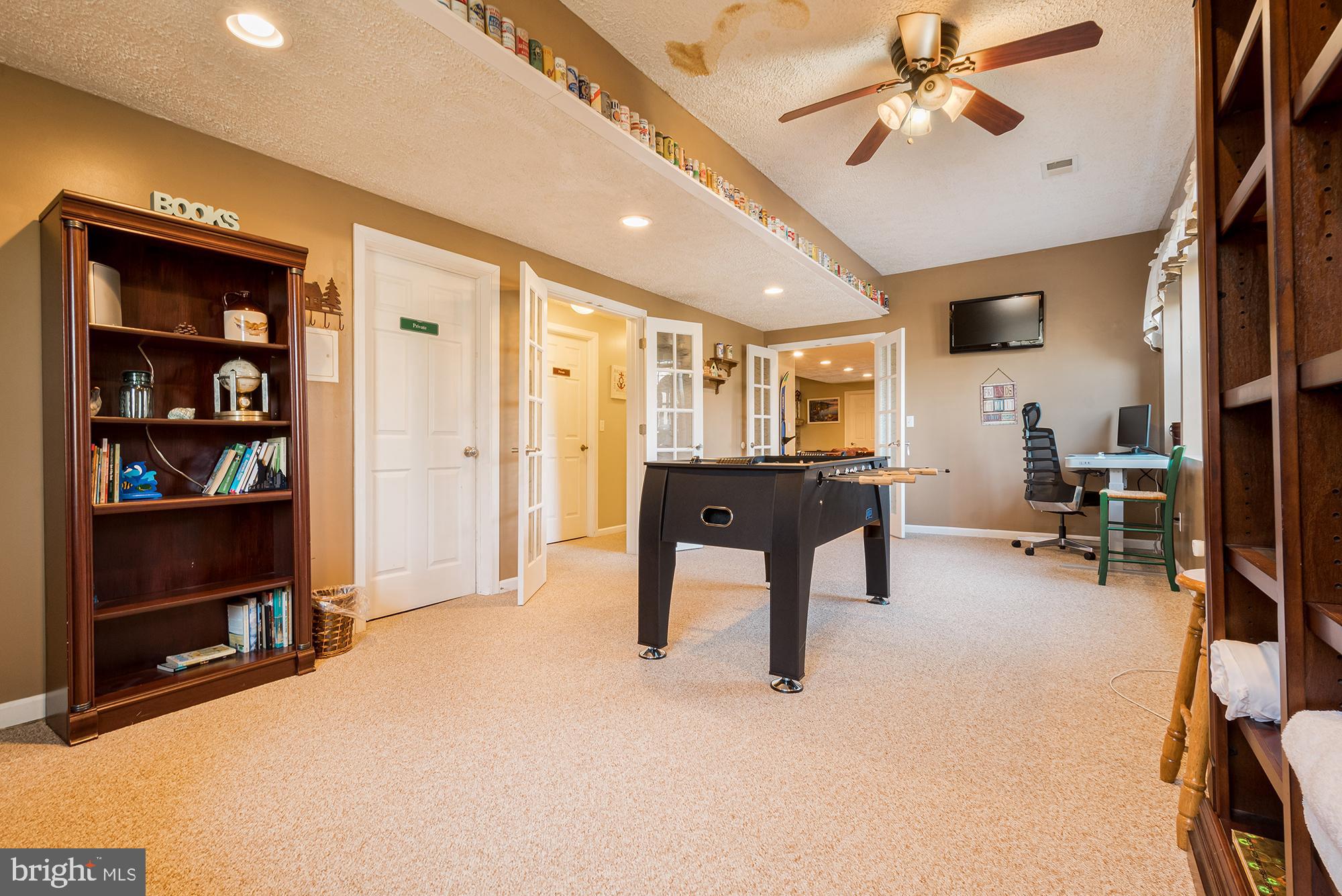 2228 Hoyes Run Road McHenry, MD 21541 - Photo 41 of 52 a view of a livingroom with furniture and a bookshelf