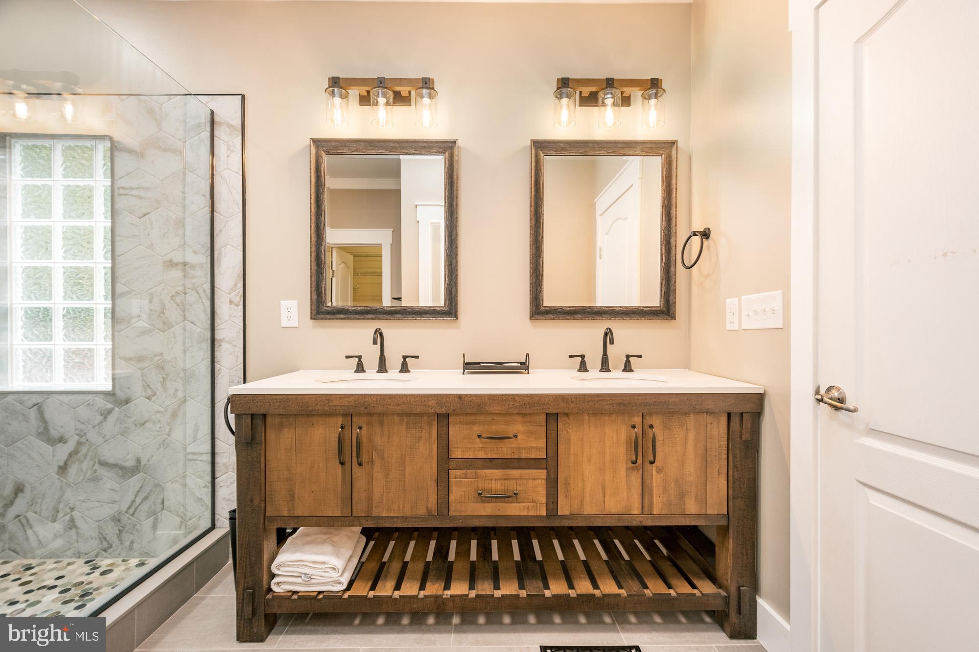2228 Hoyes Run Road McHenry, MD 21541 - Photo 10 of 52 a bathroom with a sink and a mirror
