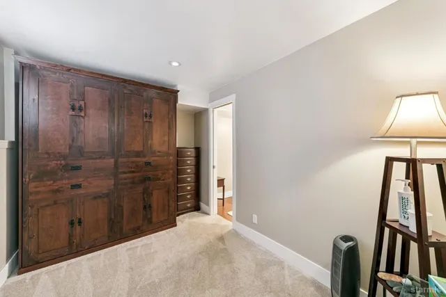 a bathroom with a shower and a sink