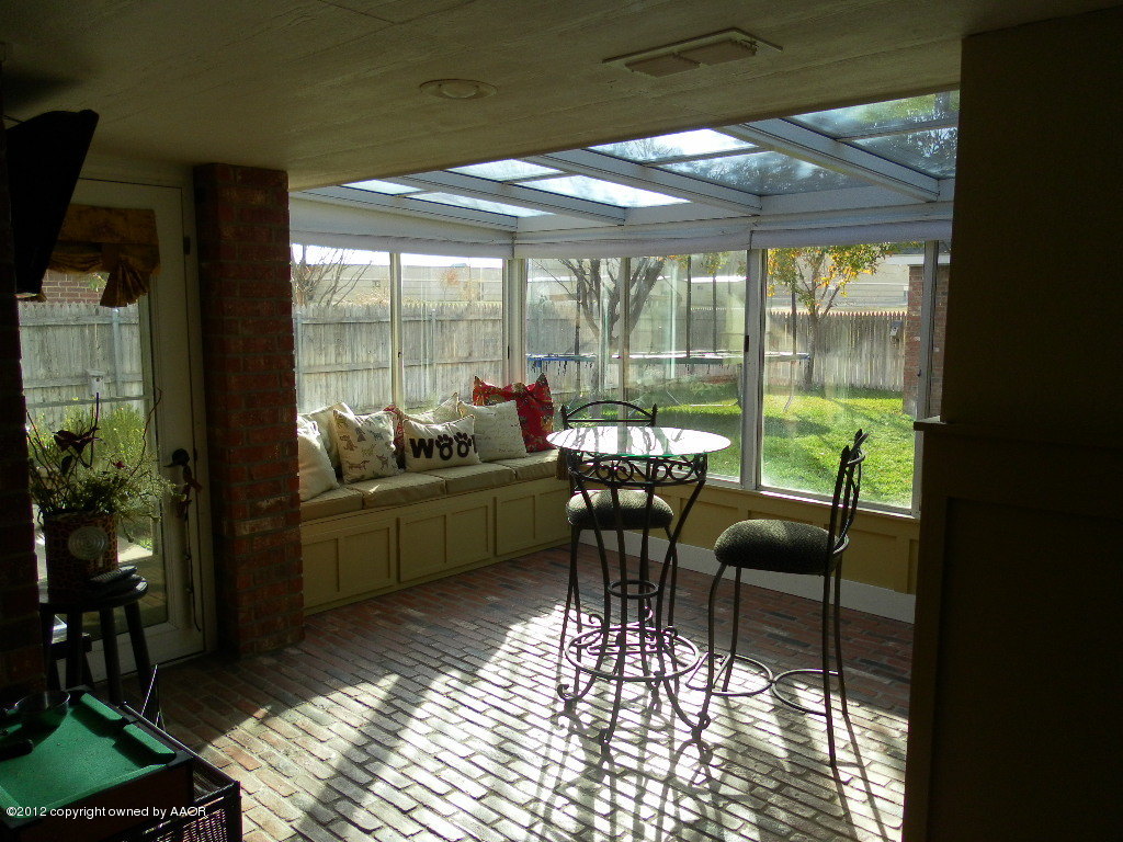 8106 Sheldon Road Amarillo, TX 79119 - Photo 8 of 9 sunroom