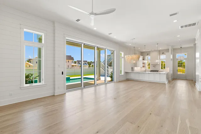 a kitchen with stainless steel appliances white cabinets and a stove