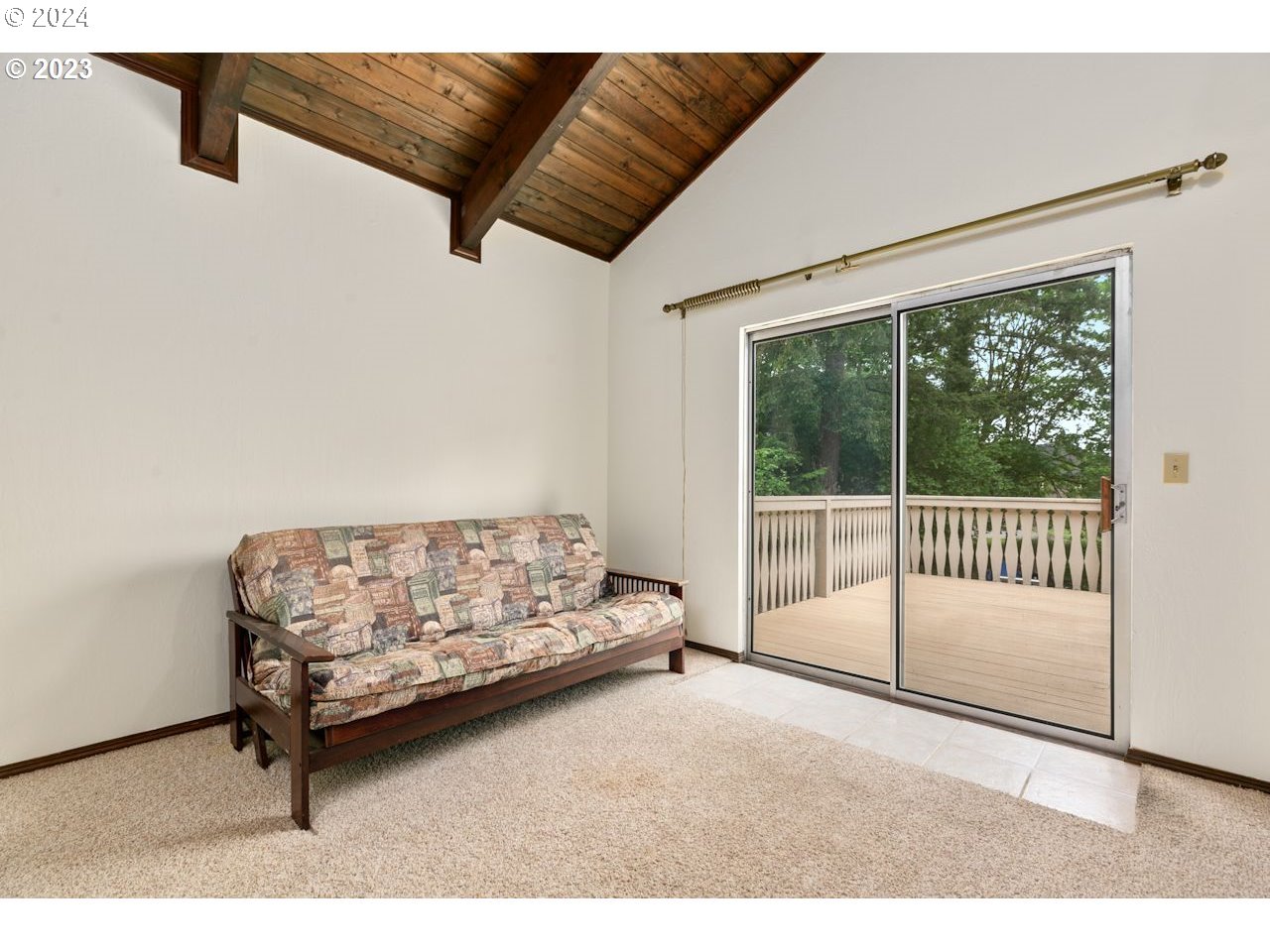 3318 Northwest 203rd Street Ridgefield, WA 98642 - Photo 17 of 28 a bedroom with a bed and a chair