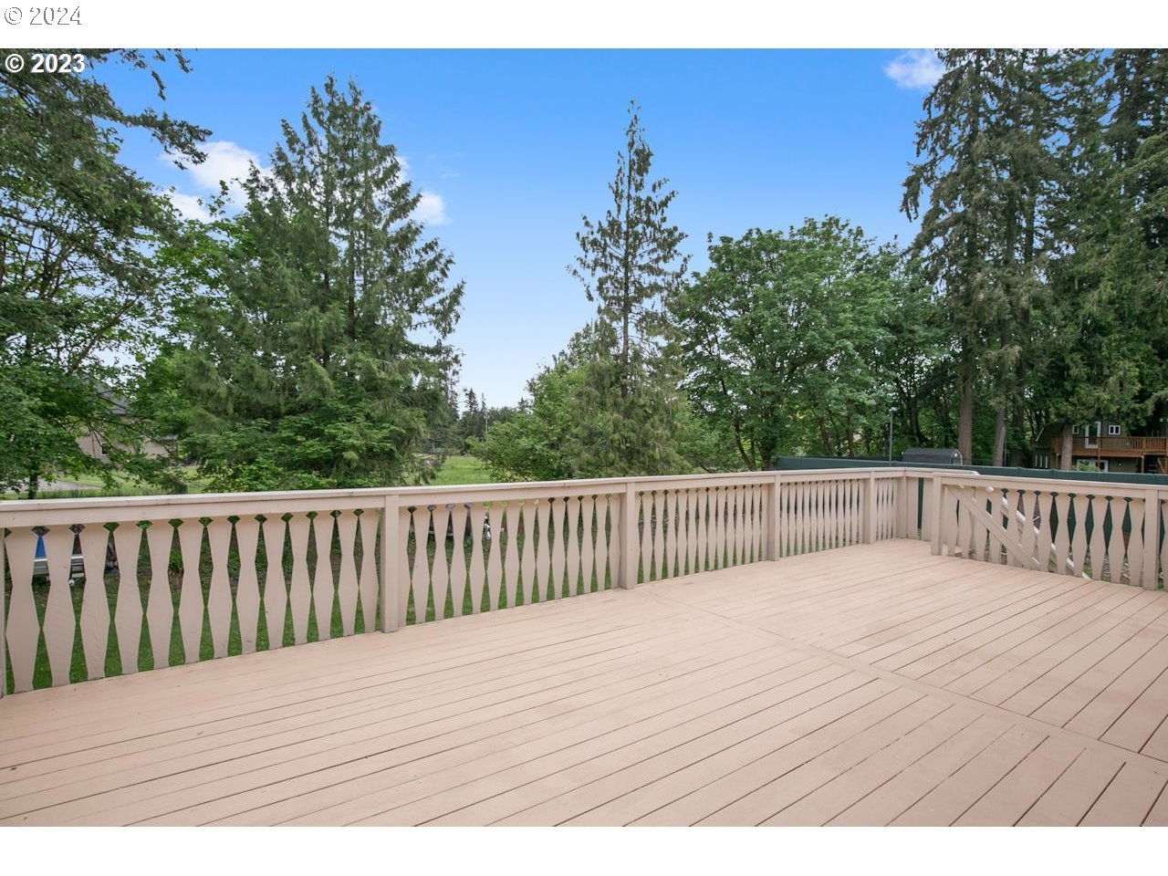 3318 Northwest 203rd Street Ridgefield, WA 98642 - Photo 25 of 28 a view of balcony with wooden floor and fence
