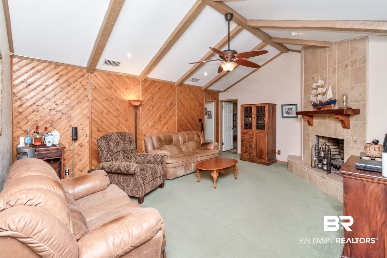 8220 Fordham Road Mobile, AL 36619 - Photo 8 of 41 Living room with carpet, a tiled fireplace, visible vents, and ceiling fan