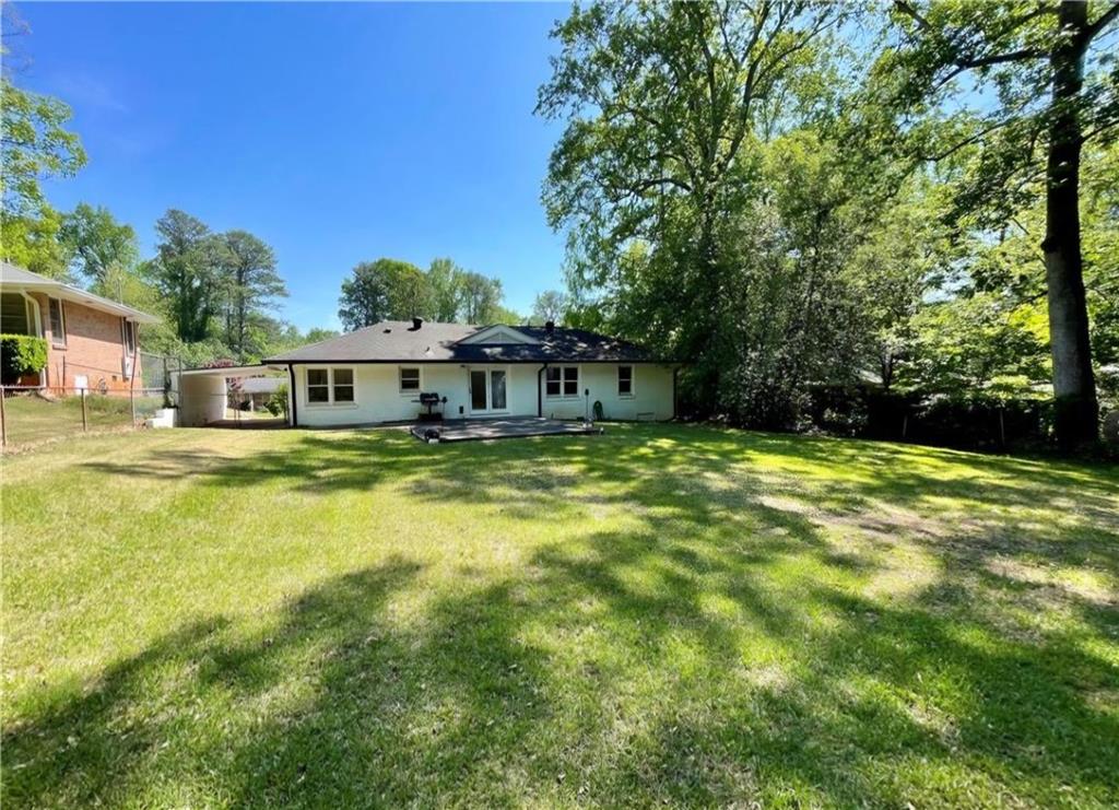 2682 Pineland Avenue Atlanta, GA 30340 - Photo 11 of 11 a house with swimming pool in front of it