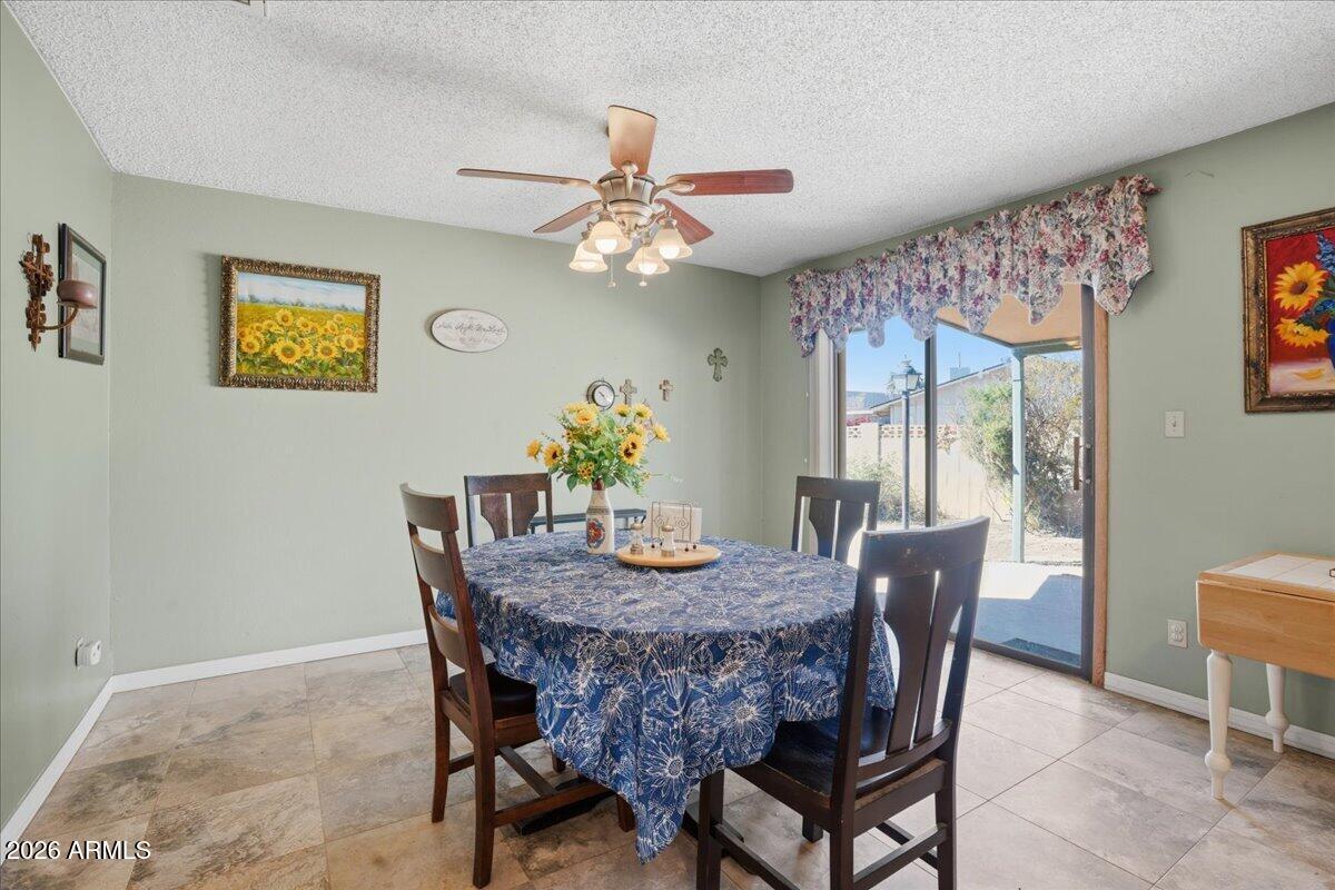 3922 South Poplar Street Tempe, AZ 85282 - Photo 11 of 41 a dining room with furniture and window