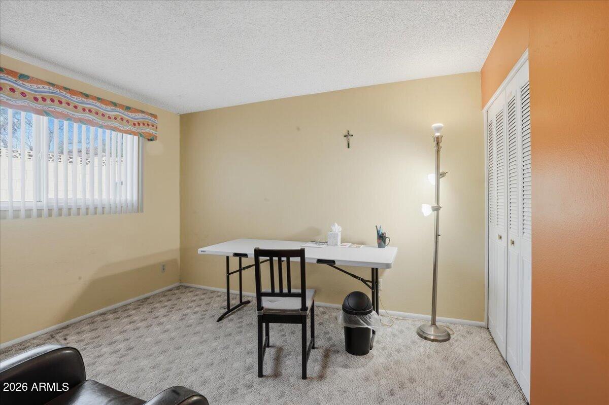 3922 South Poplar Street Tempe, AZ 85282 - Photo 25 of 41 a view of a workspace with furniture and a window